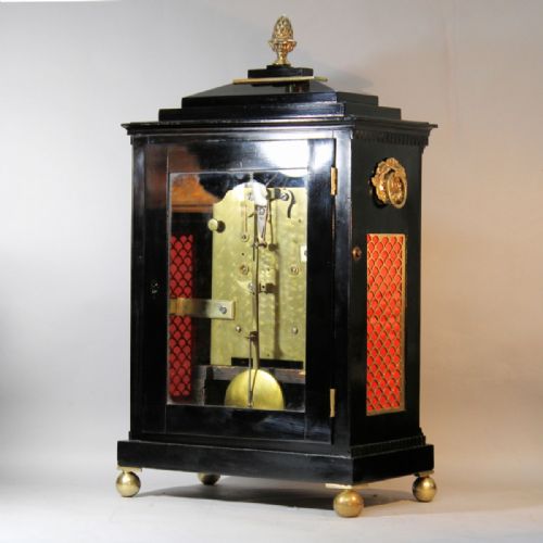 A REGENCY PERIOD ENGLISH CHAMFER TOP BRACKET CLOCK IN AN EBONISED CASE CIRCA 1820 - ADDITIONAL PHOTO 4