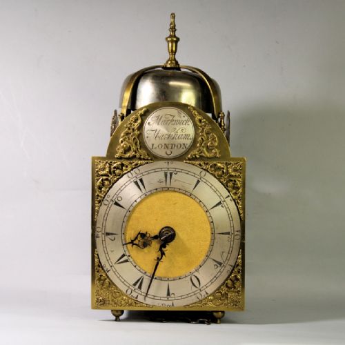 A Small, 18th Century Lantern Clock with a Turkish Dial. By Markwick Markham, London.
circa 1730.
