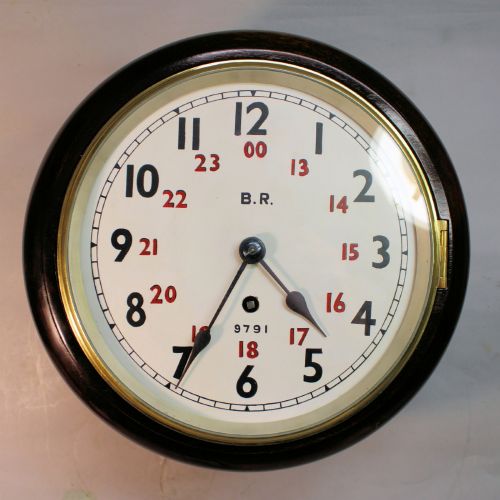 RAILWAY 8 DIAL ENGLISH FUSEE WALL CLOCK IN A MAHOGANY CASE CIRCA 1880