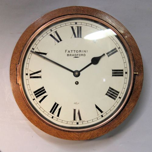 Oak Cased Wall 'Dial' Clock with Lever Escapement, by Elliott. A Rare Style. Circa 20th Century.