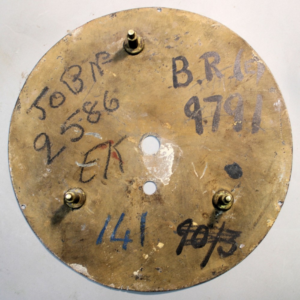 A round Victorian mahogany fusee wall clock featuring an eight-inch white dial with black and red numbers and a brass bezel. View IX