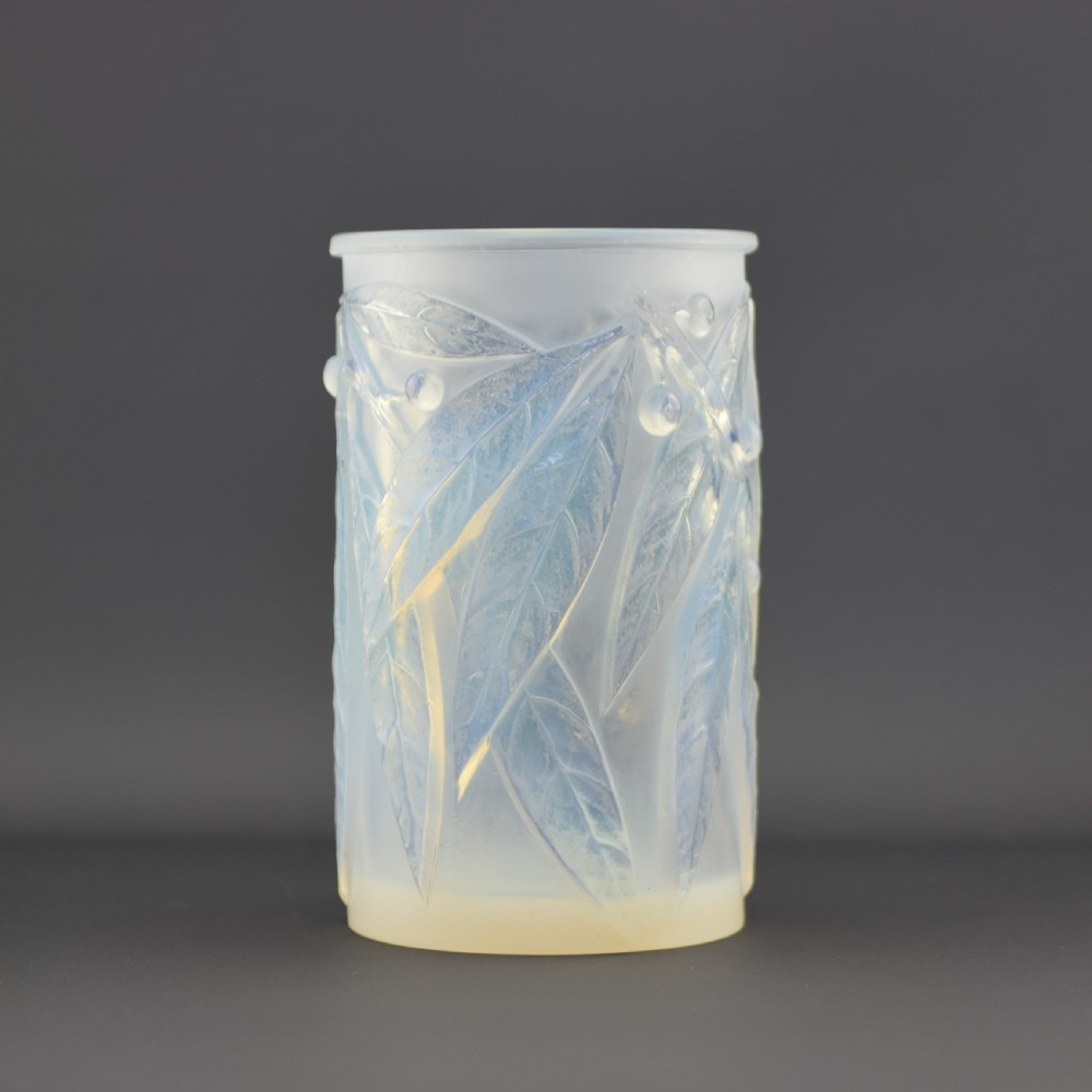 A cylindrical Art Deco opalescent glass vase decorated with relief-moulded laurel leaves and berries. View III