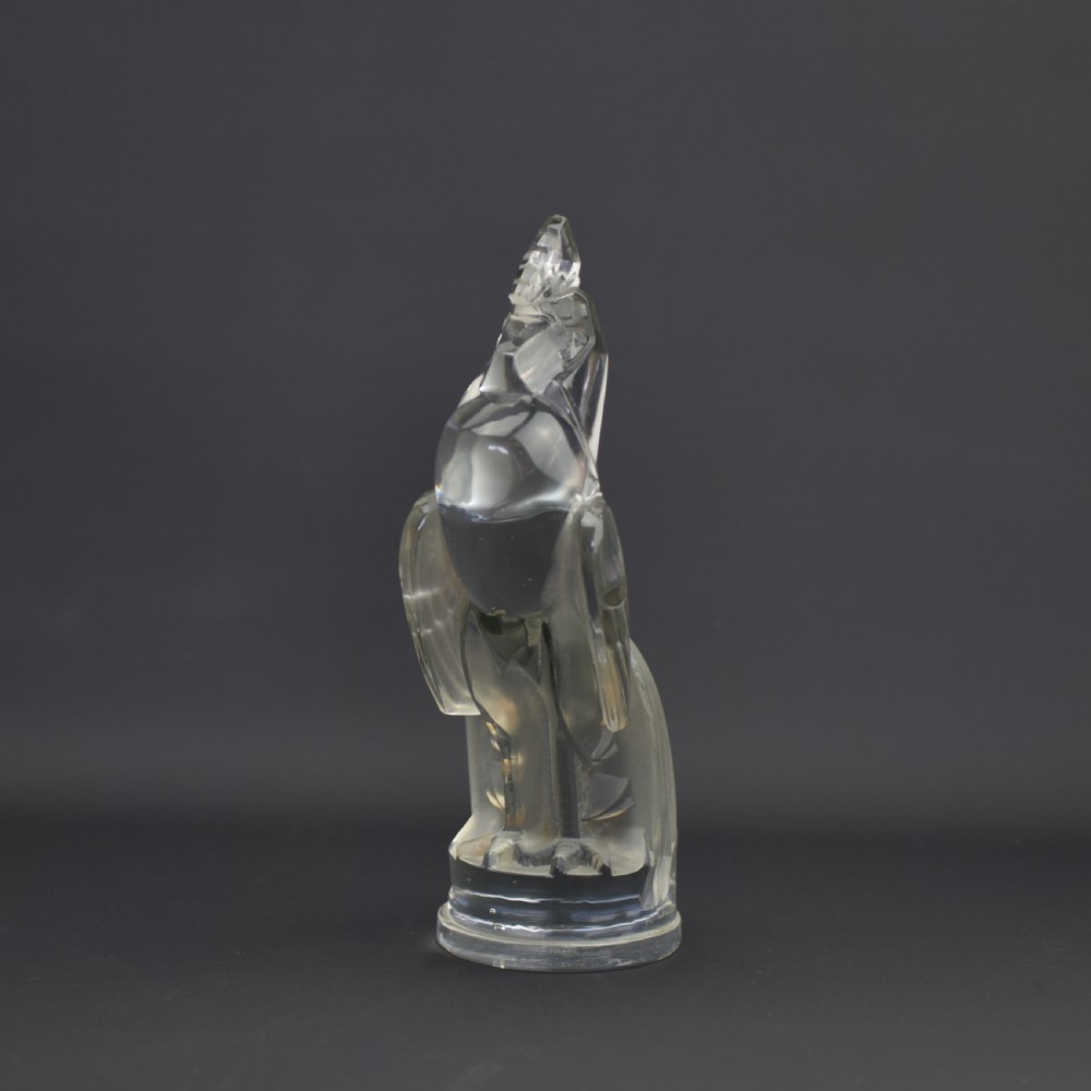 An Art Deco press-moulded clear glass car mascot designed in the form of a stylised standing cockerel. View II