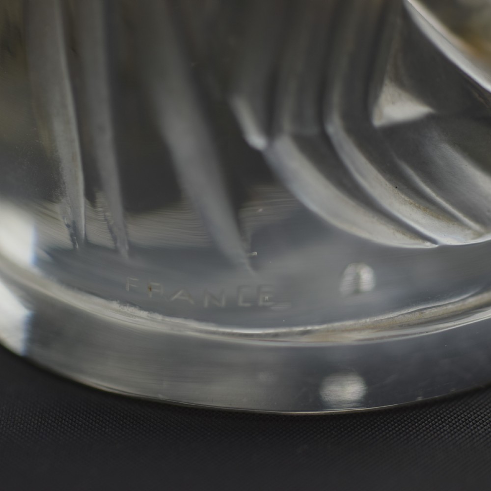 An Art Deco press-moulded clear glass car mascot designed in the form of a stylised standing cockerel. View VIII