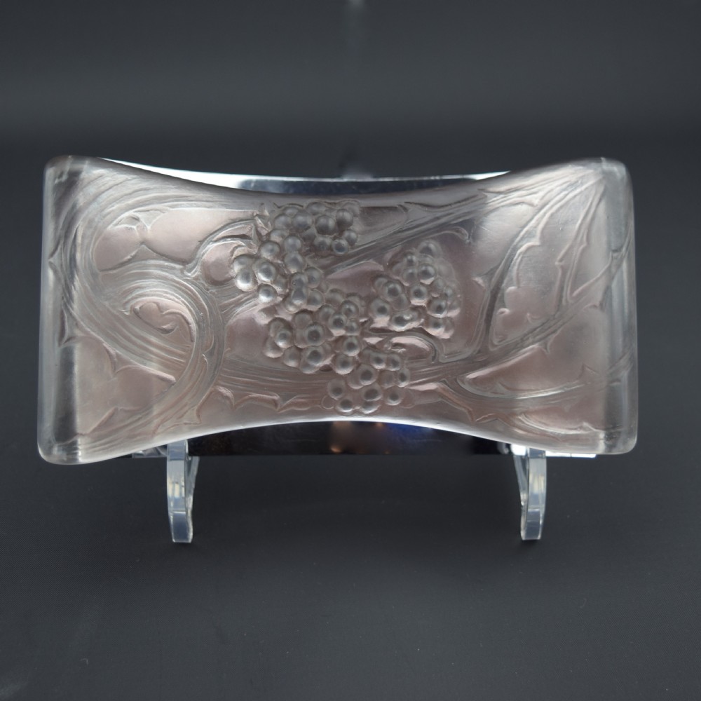 A rectangular Rene Lalique Art Deco clear and frosted glass rocker blotter handle featuring moulded blackberry and foliage decoration.