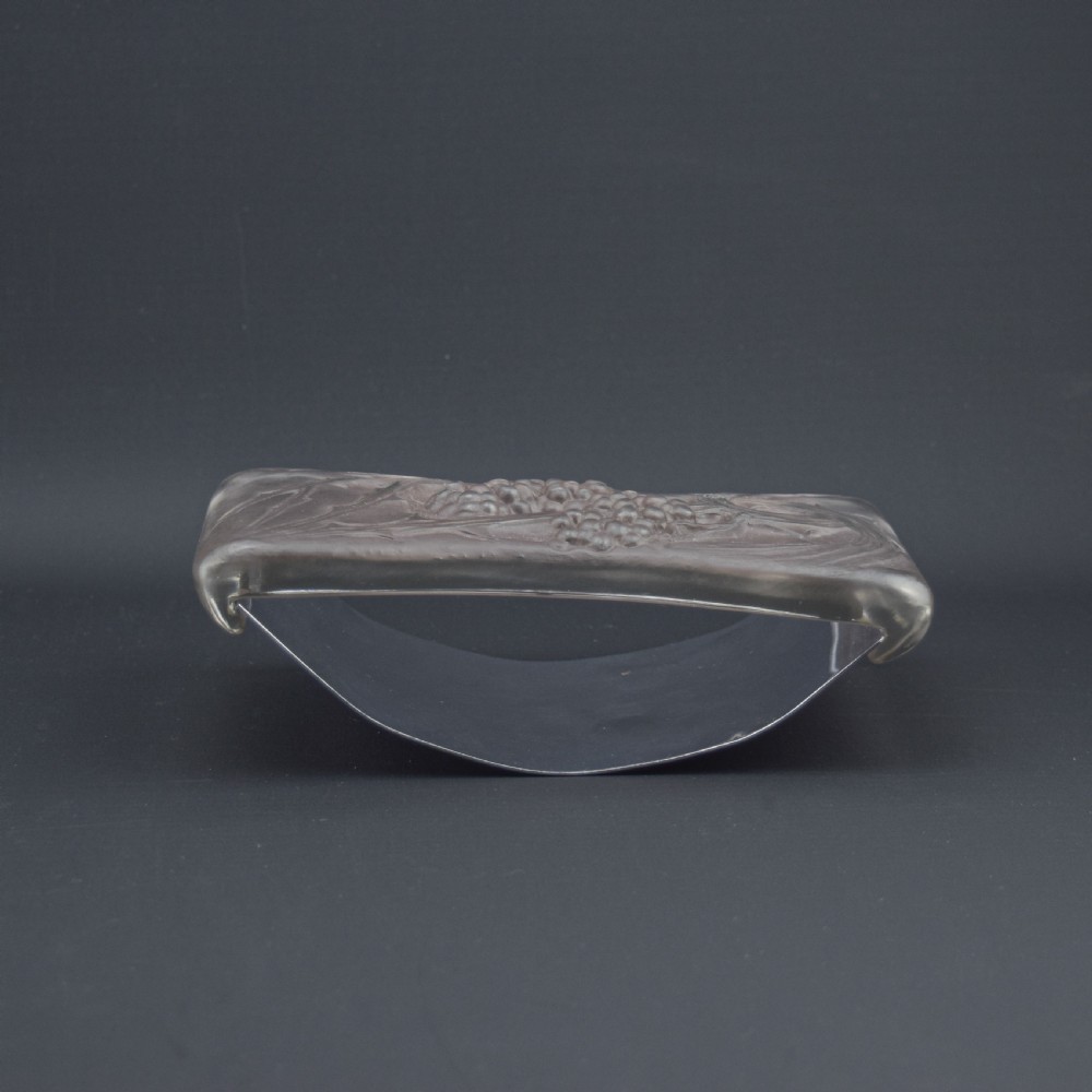 A rectangular Rene Lalique Art Deco clear and frosted glass rocker blotter handle featuring moulded blackberry and foliage decoration. View II