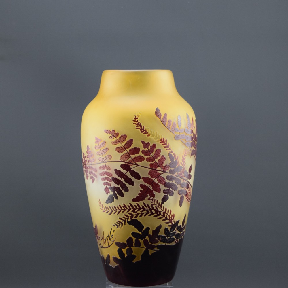 An Art Nouveau cameo glass vase featuring frosted yellow glass acid-etched with dark burgundy fern leaf motifs. View V
