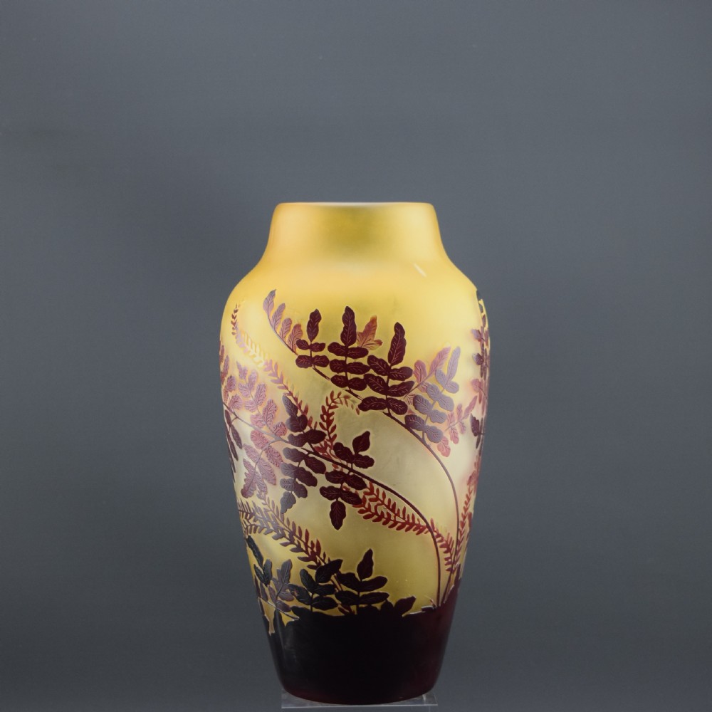 An Art Nouveau cameo glass vase featuring frosted yellow glass acid-etched with dark burgundy fern leaf motifs. View VI