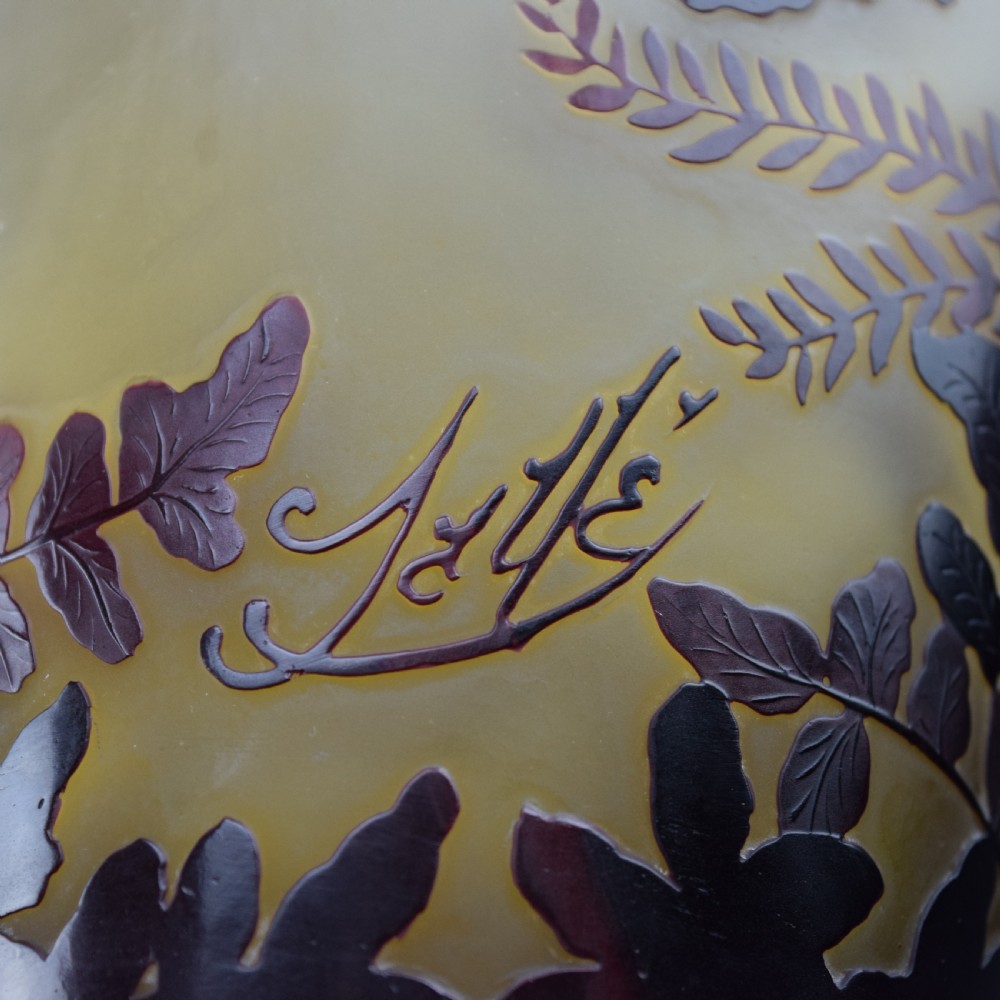 An Art Nouveau cameo glass vase featuring frosted yellow glass acid-etched with dark burgundy fern leaf motifs. View VIII