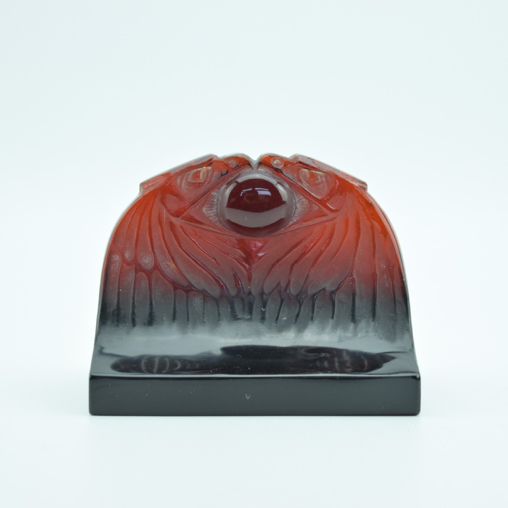 Double headed eagle paperweight in deep amber glass  C1914