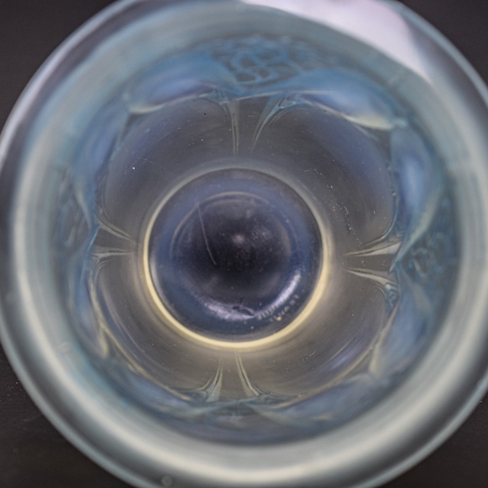 An Art Deco Rene Lalique opalescent glass vase featuring high relief carvings of budgerigars perched on branches with subtle blue staining. View X