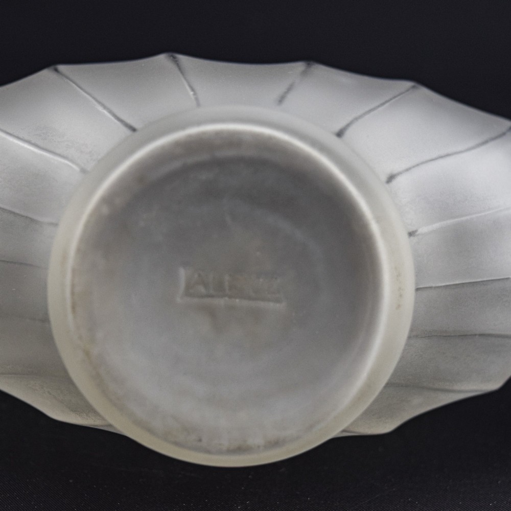 A frosted clear glass decanter featuring a wide, vertically ribbed bulbous body tapering into a slender neck. View VI