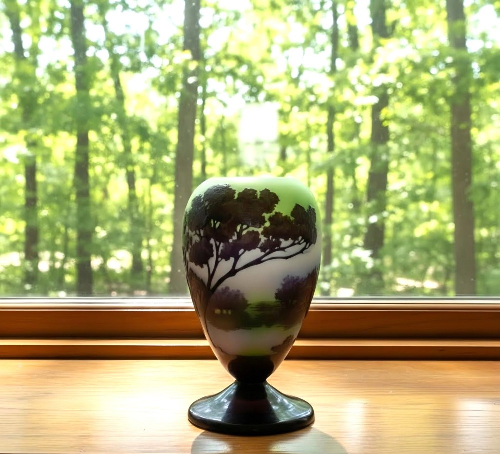 An Art Nouveau cameo glass footed vase depicting a dark purple tree landscape against a frosted green and white background. View VI
