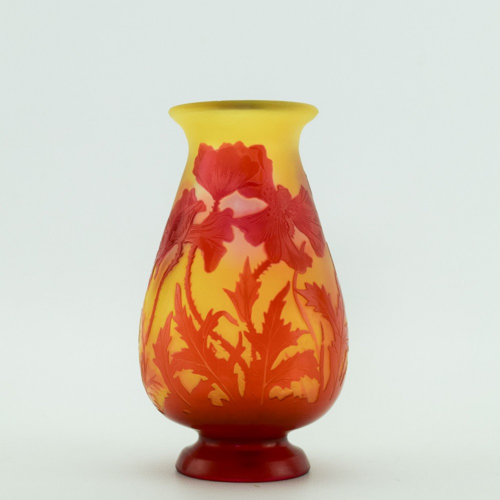 An Art Nouveau French cameo glass footed vase featuring an acid-etched red poppy design over a translucent yellow and orange ground. View VI
