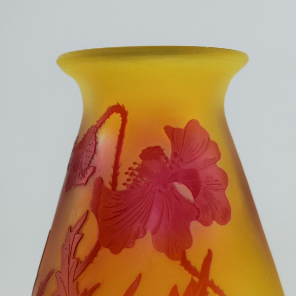 An Art Nouveau French cameo glass footed vase featuring an acid-etched red poppy design over a translucent yellow and orange ground. View IX