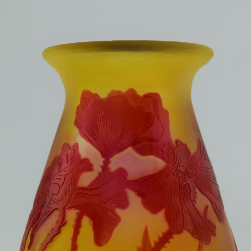 An Art Nouveau French cameo glass footed vase featuring an acid-etched red poppy design over a translucent yellow and orange ground. View X