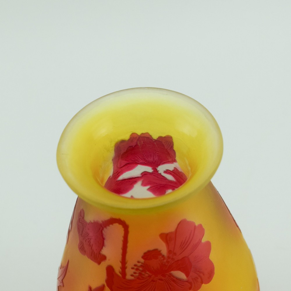 An Art Nouveau French cameo glass footed vase featuring an acid-etched red poppy design over a translucent yellow and orange ground. View XI