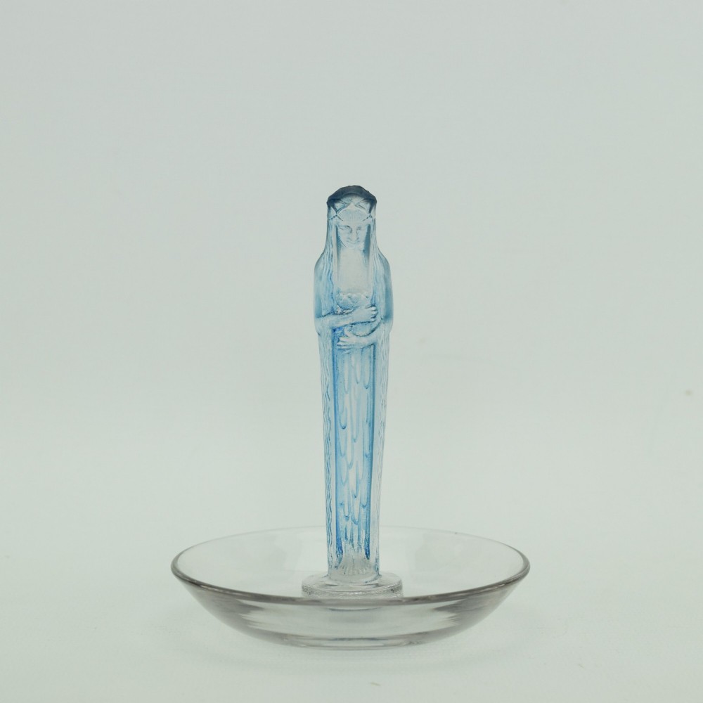 An Art Deco clear glass shallow dish featuring a central moulded frosted blue glass figure of a standing female water nymph.
