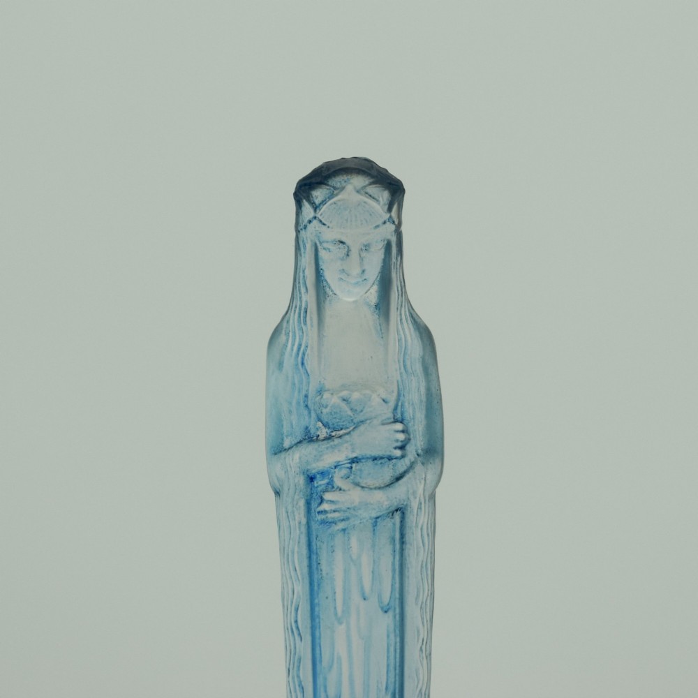 An Art Deco clear glass shallow dish featuring a central moulded frosted blue glass figure of a standing female water nymph. View IV