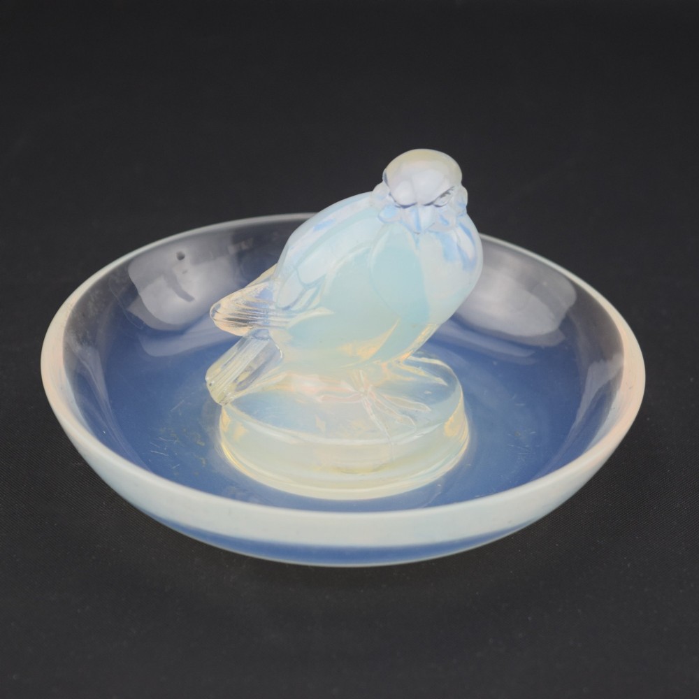 An Art Deco opalescent glass circular dish featuring a sculpted sparrow figure standing in the centre. View II