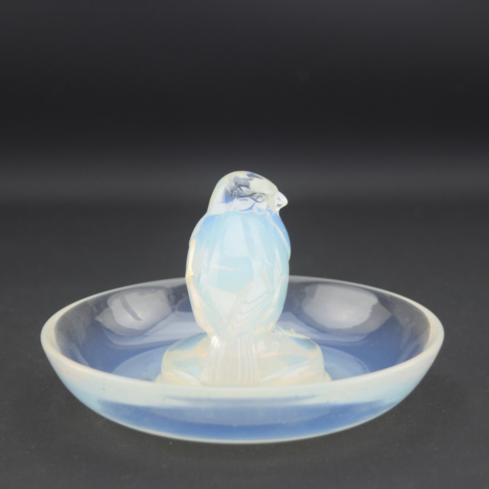 An Art Deco opalescent glass circular dish featuring a sculpted sparrow figure standing in the centre. View VI