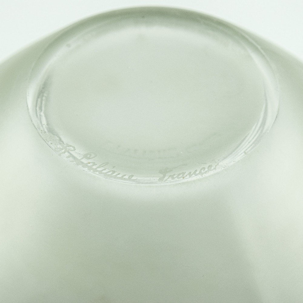 An Art Deco frosted clear glass vase featuring a rounded body with raised geometric chevron reliefs and a short flared neck. View VIII