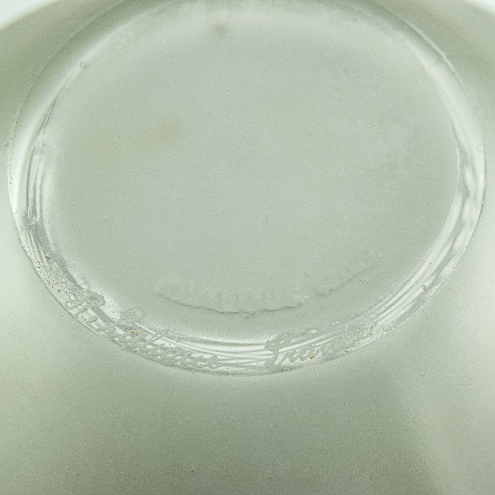 An Art Deco frosted clear glass vase featuring a rounded body with raised geometric chevron reliefs and a short flared neck. View IX