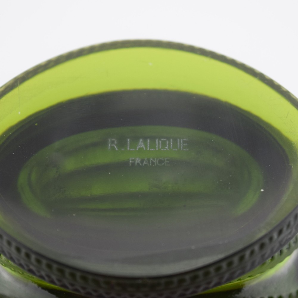 An olive green moulded glass vase with tiered horizontal ridging and frosted bird motifs descending the tapered sides. View VIII