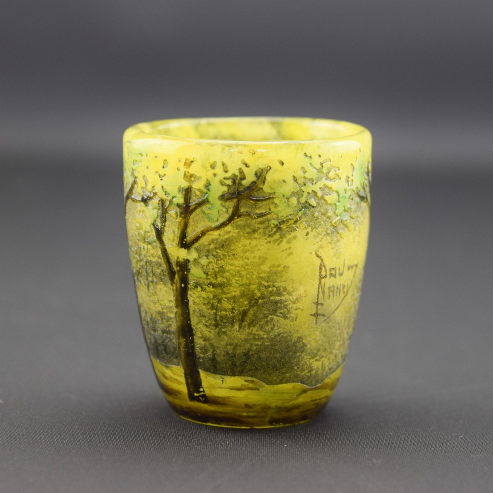 An Art Nouveau yellow cameo glass miniature vase featuring acid-etched and enamelled dark green tree trunks and summer foliage. View II