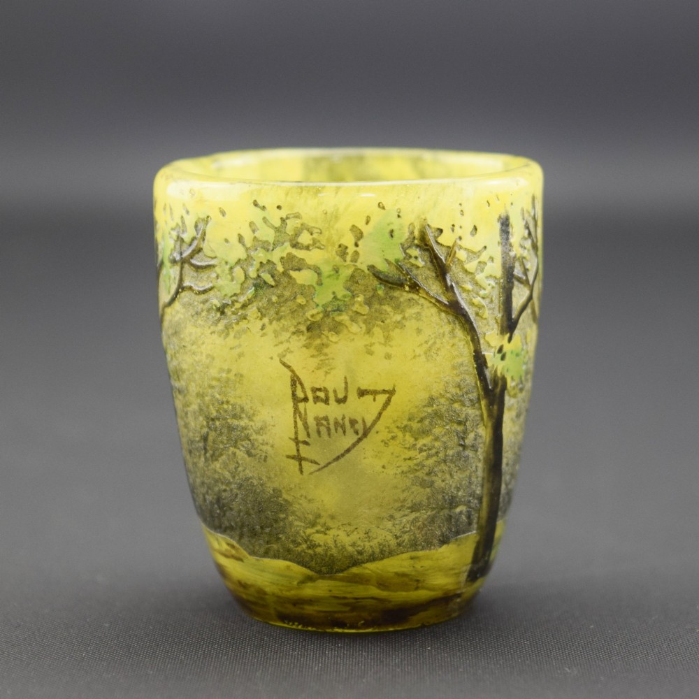 An Art Nouveau yellow cameo glass miniature vase featuring acid-etched and enamelled dark green tree trunks and summer foliage. View III