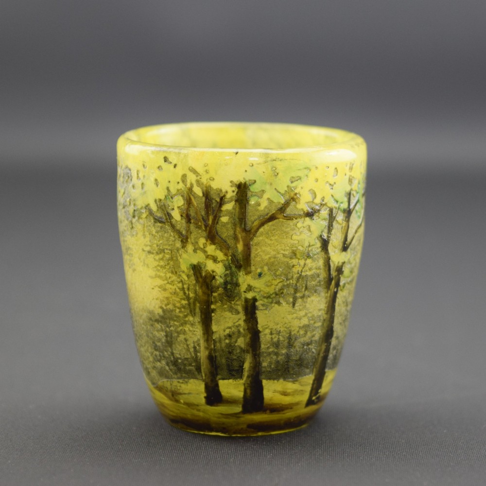 An Art Nouveau yellow cameo glass miniature vase featuring acid-etched and enamelled dark green tree trunks and summer foliage. View VI
