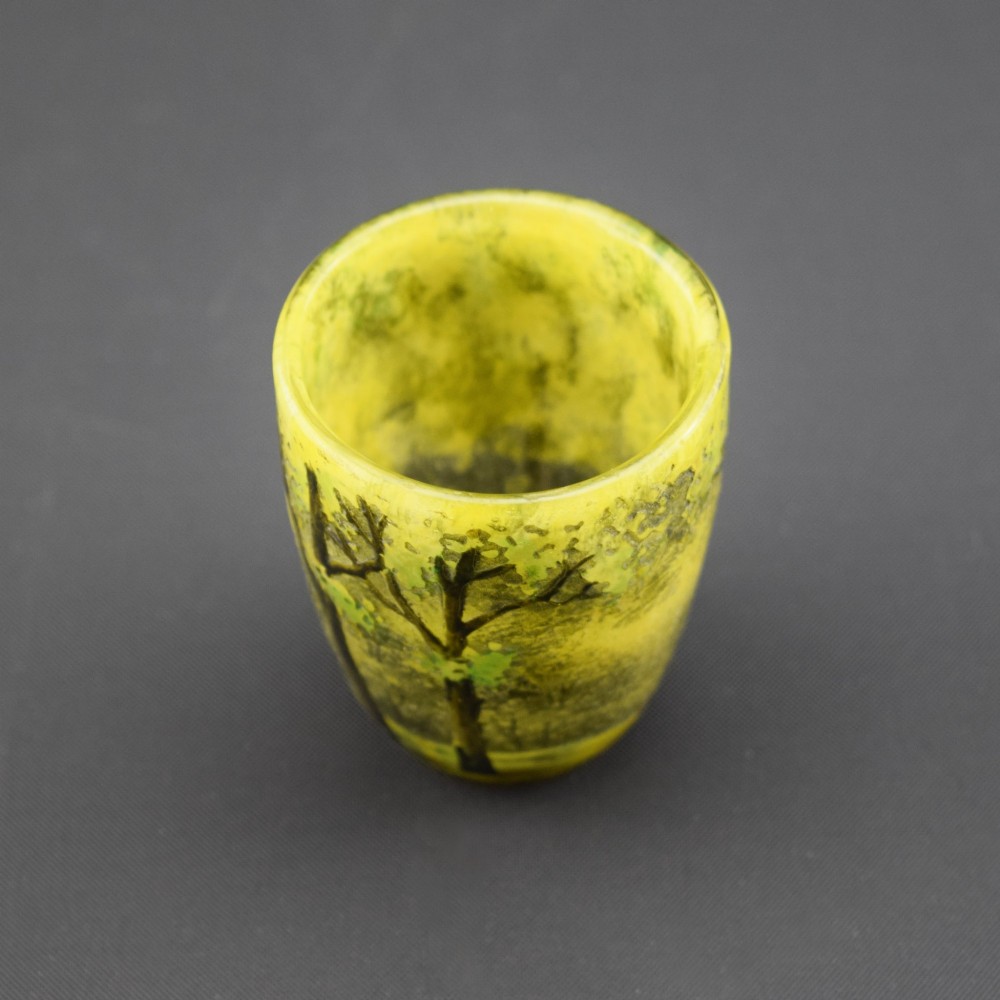 An Art Nouveau yellow cameo glass miniature vase featuring acid-etched and enamelled dark green tree trunks and summer foliage. View VIII