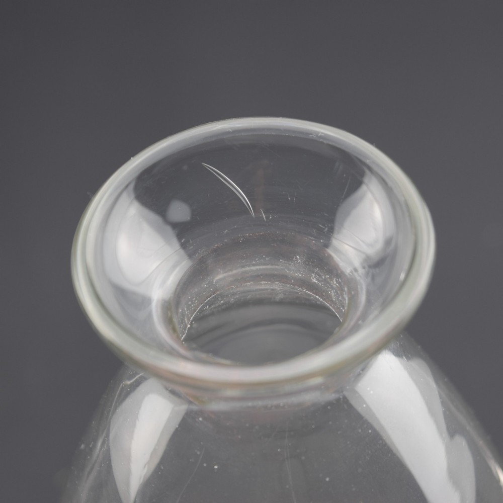 A pair of clear glass Art Deco conical decanters featuring elongated frosted glass stoppers with delicate leaf motifs. View VIII