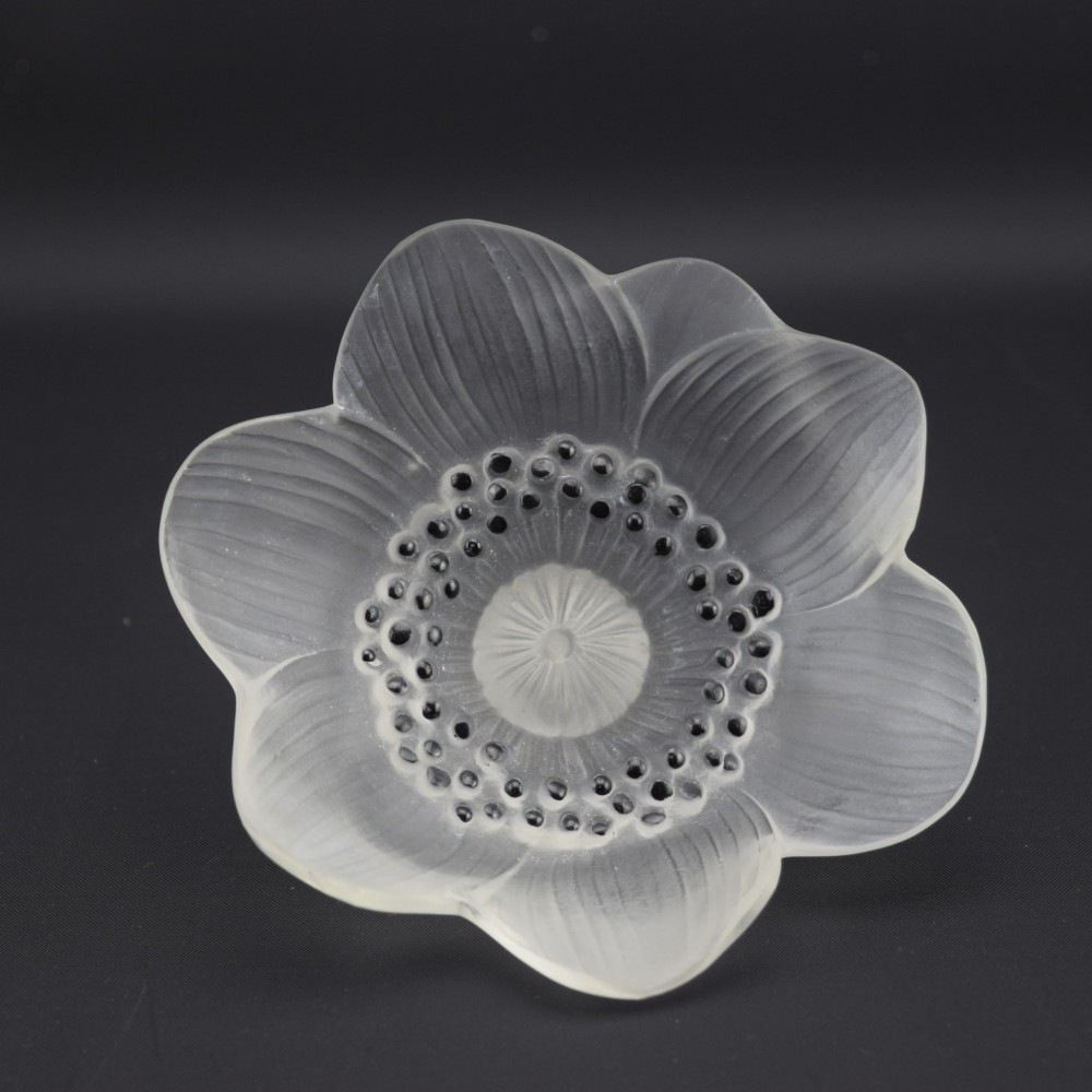 A Rene Lalique frosted clear glass paperweight shaped as an open anemone flower with black enamelled central detail. View V
