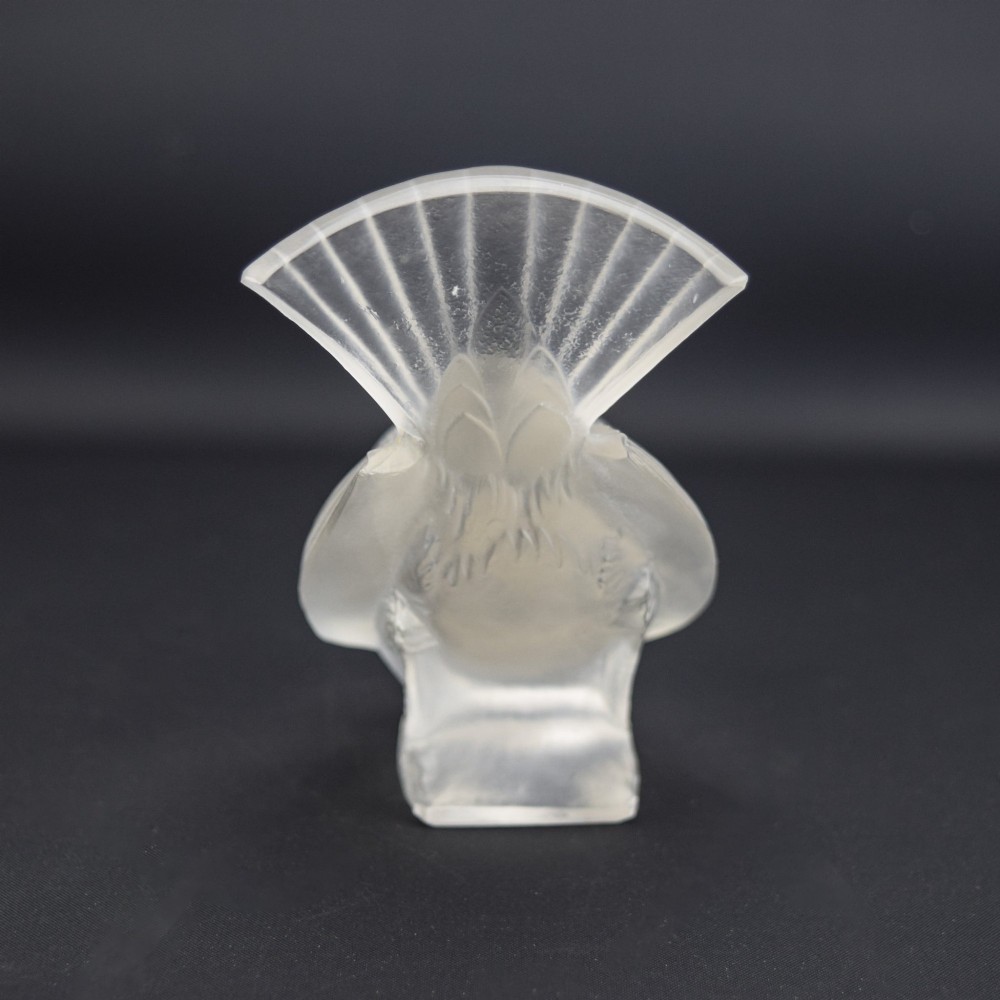 An Art Deco clear and frosted glass paperweight depicting a sparrow with its head lowered in a foraging pose. View IV