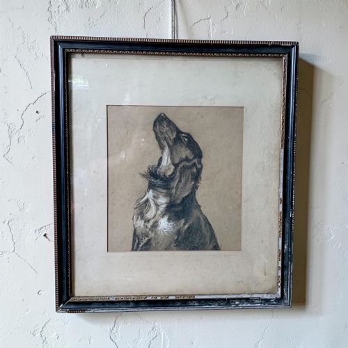 A CHARMING ANTIQUE CHARCOAL DRAWING OF A DOG