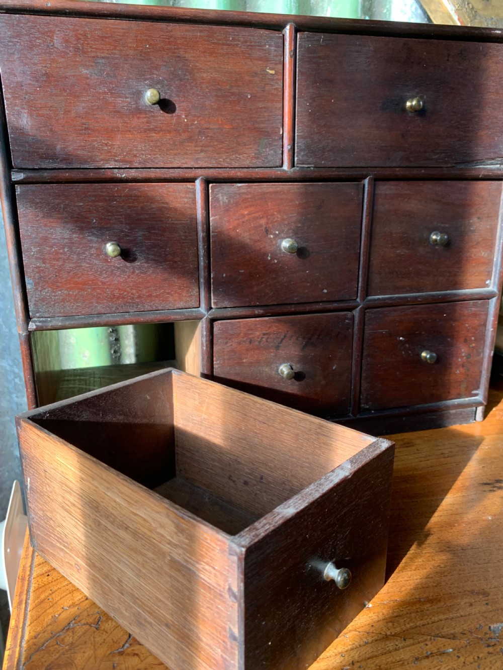 UNUSUAL 19th CENTURY DOUBLE SIDED BANK OF DRAWERS View V