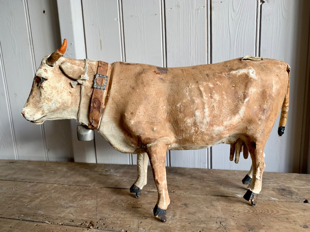 ANTIQUE TOY MODEL OF A COW