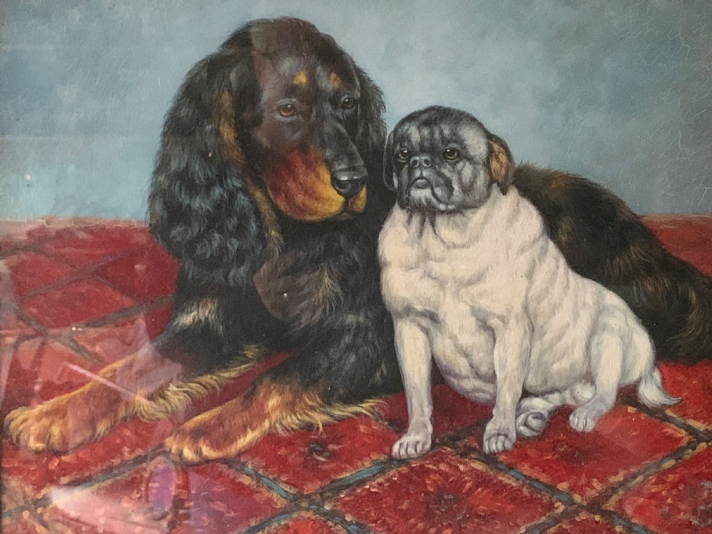 An oil painting on wooden panel depicting a black and tan spaniel resting next to a pug on a red patterned carpet inside a dark wooden frame. View III