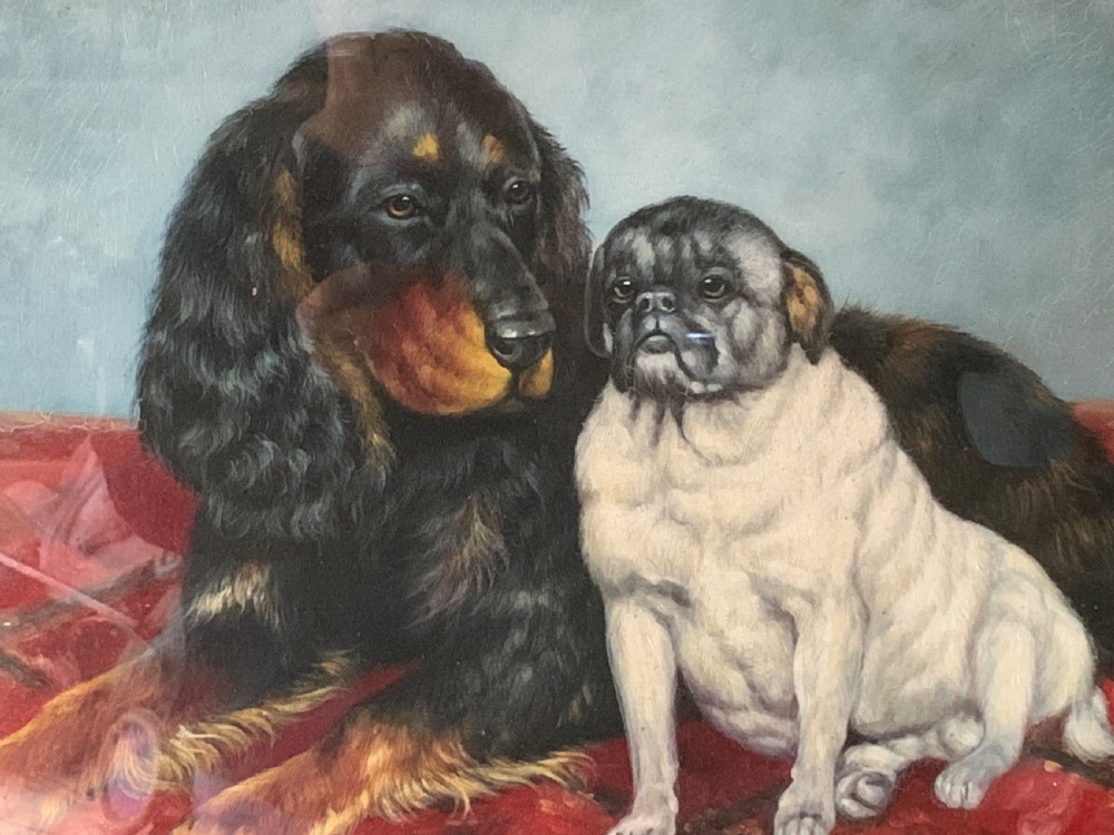 An oil painting on wooden panel depicting a black and tan spaniel resting next to a pug on a red patterned carpet inside a dark wooden frame. View V