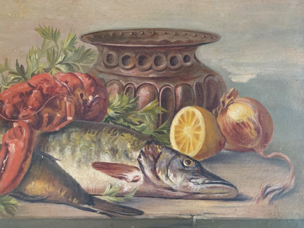 Horizontal oil painting depicting a red lobster resting over a large fish, accompanied by a halved lemon, an onion, herbs, and a metallic vessel on a wooden surface. View IV