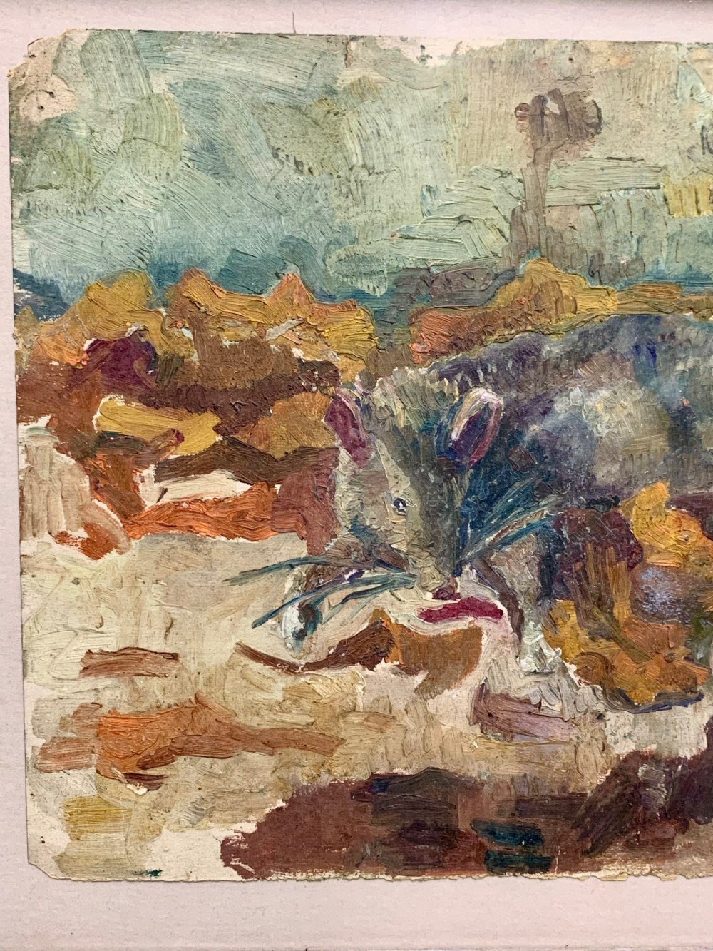 An antique French Impressionist oil study depicting a rodent amongst earthy foliage within a weathered grey wooden frame. View V