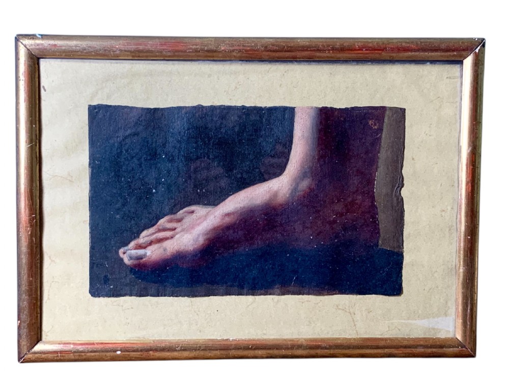 An early 19th-century academic oil study depicting a human foot rendered on paper, presented within a slender gilded wooden frame.