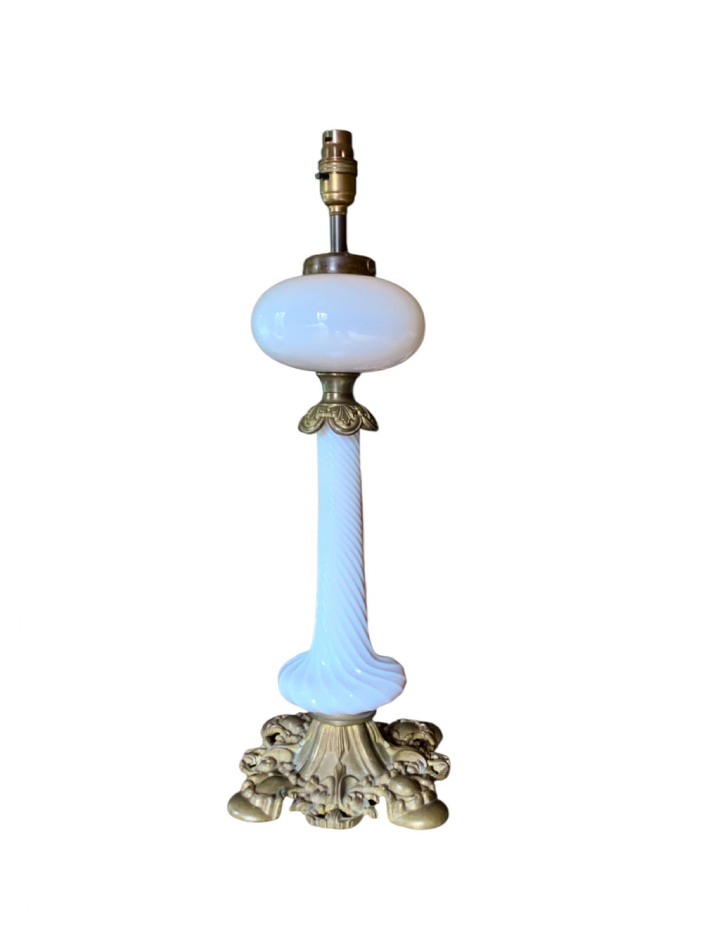 A 19th-century Victorian table lamp featuring a white fluted opaline glass column set on an ornate cast bronze base. View II