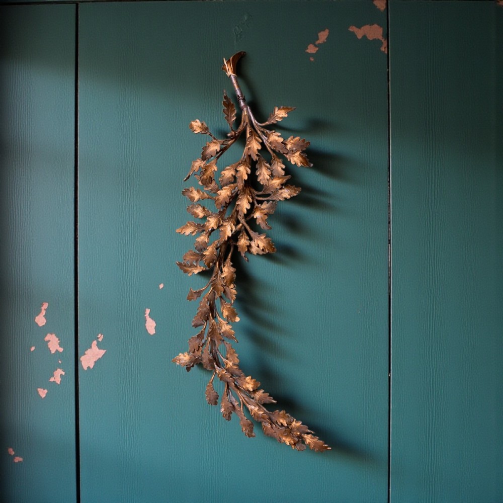 A LARGE FRENCH GILT METAL DECORATIVE OAK BRANCH