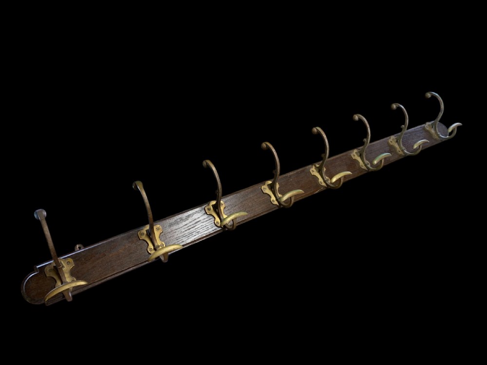 FABULOUS 19th CENTURY RUN OF LARGE BRASS COAT & HAT HOOKS View II