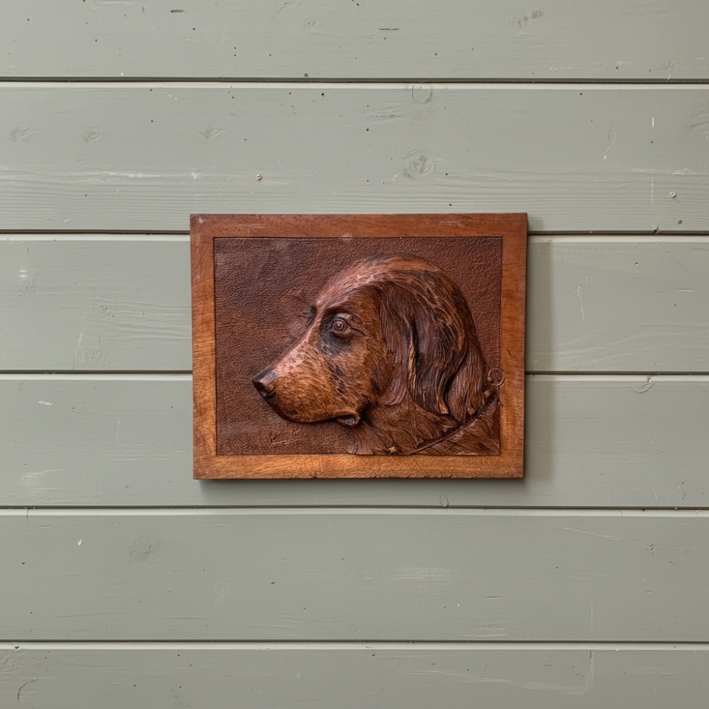 EARLY 20th C CARVED PANEL OF A DOG’S HEAD