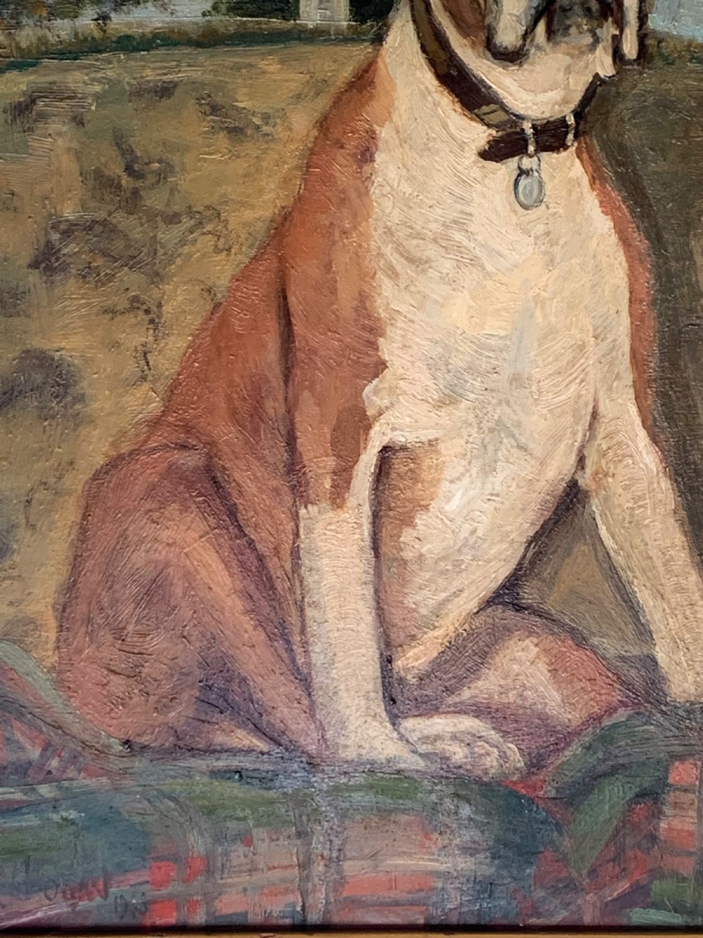 A framed oil painting on board depicting a brown and white Boxer dog seated indoors on a patterned sofa. View VII
