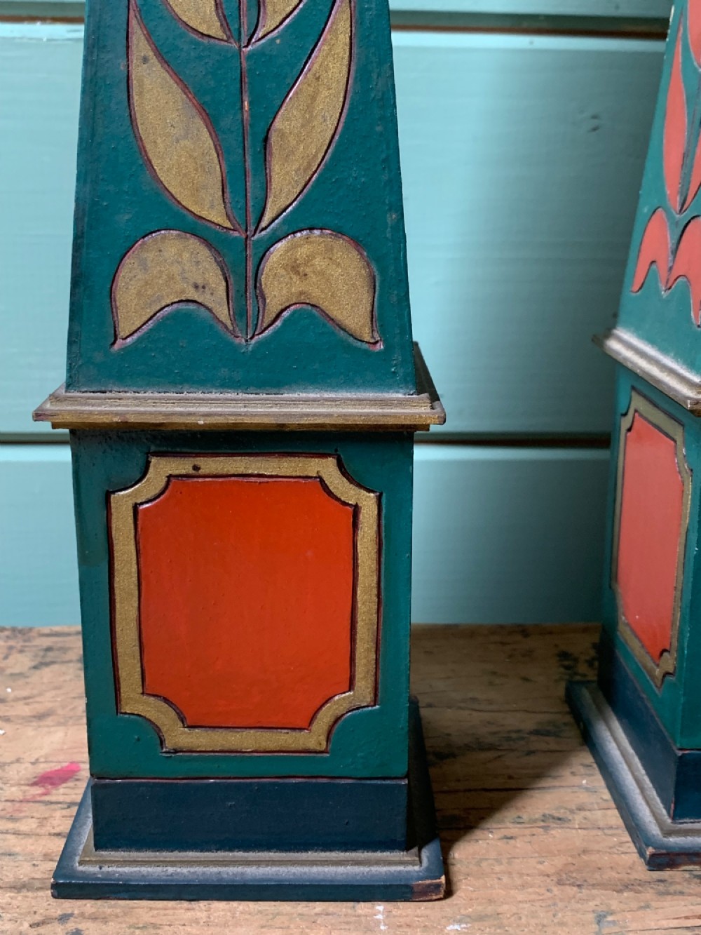 A DECORATIVE PAIR OF ANTIQUE POLYCHROME PAINTED OBELISKS View V