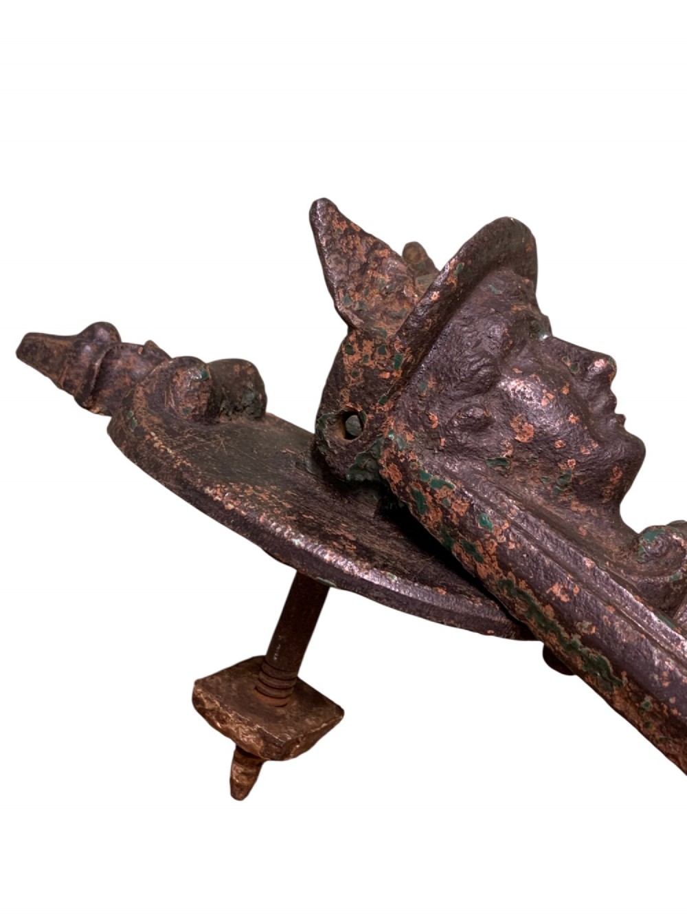 A Victorian cast iron door knocker featuring a sculpted classical Hermes head atop a drop-down loop striker. View II
